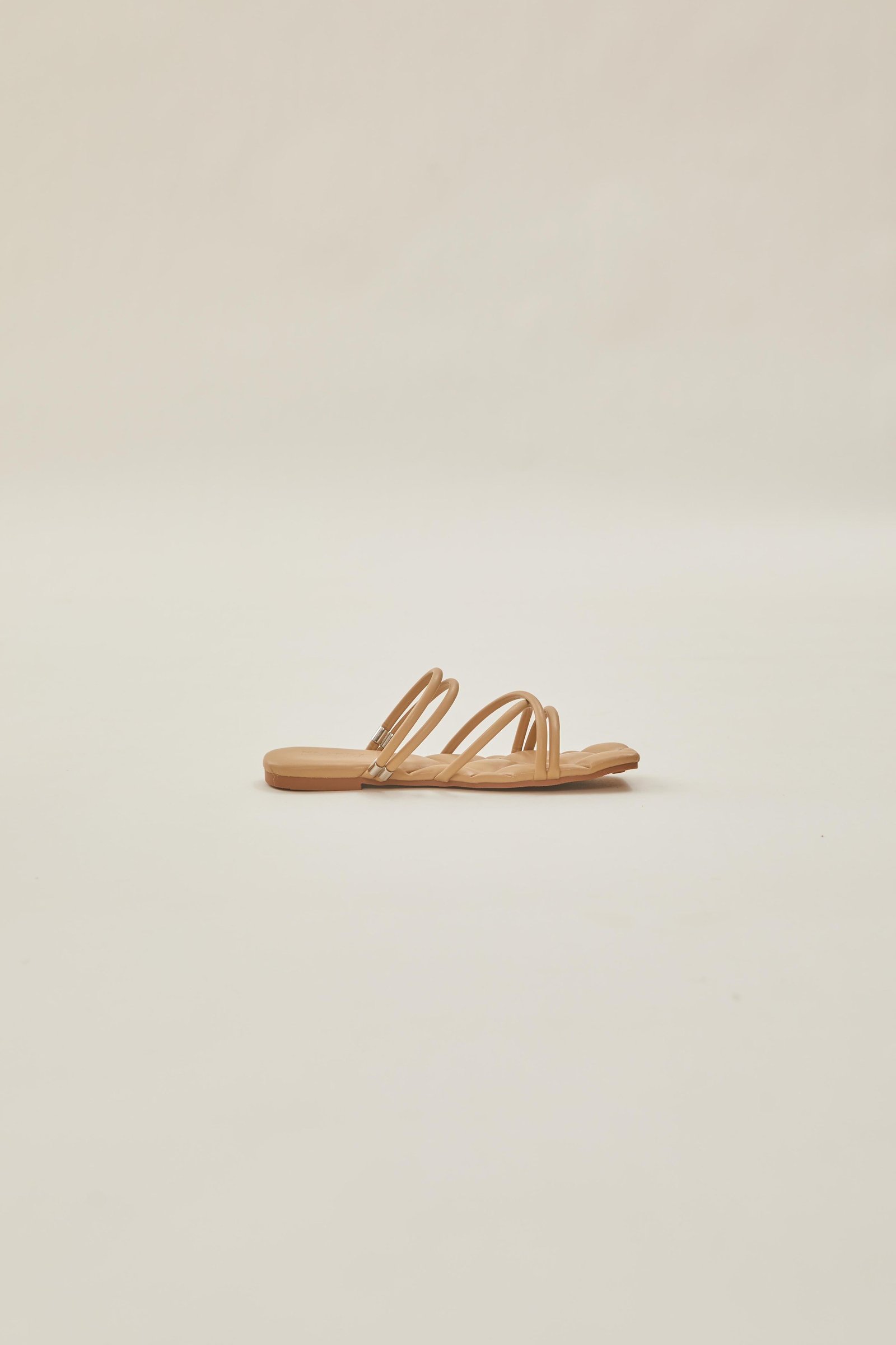 Lea Cross Sandals in Beige